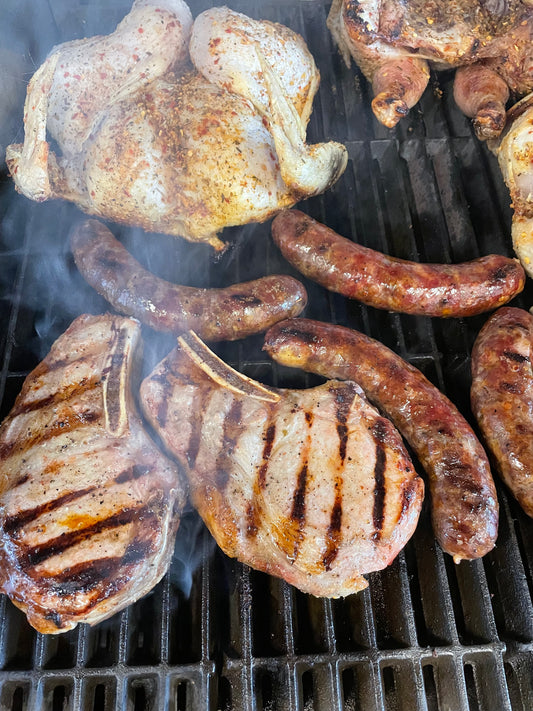 Sonny's Farm regenerative meats on the grill, pastured chicken, heritage pork sausage, heritage pork chops