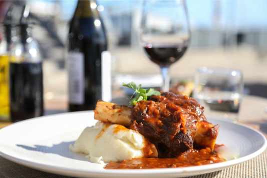 Sonny's Farm pastured lamb shanks prepared in a braised red wine sauce